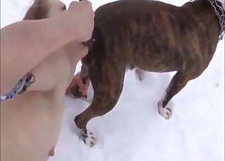 Naked Russian chick treats Pit Bull with rimming out in the snow
