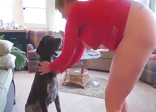 Mature lady watches bestiality before starring in a zoophilic sex vid