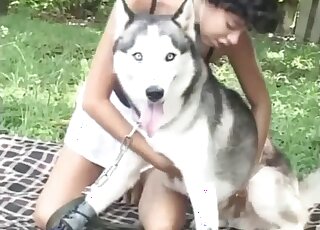 Amateur ebony babe shares intimate outdoor scenes alongside her dog