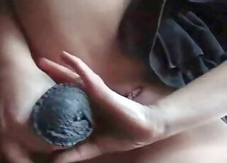 Naughty blond slut spreads her legs widely to welcome horse's shaft inside