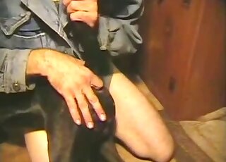 Gay anal sex tape featuring a zoophile dude and his black dog